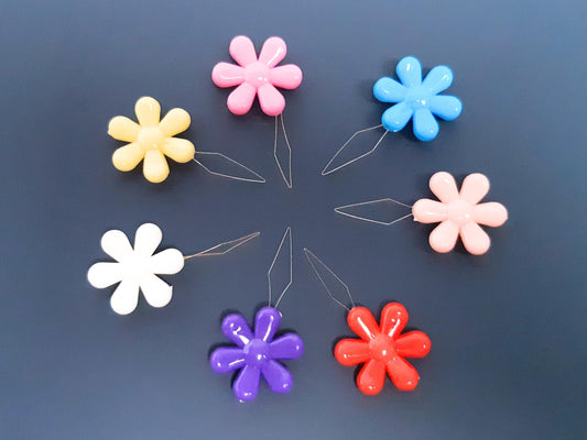 Daisy flower sewing needle threaded