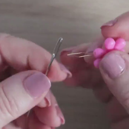 Daisy flower sewing needle threaded